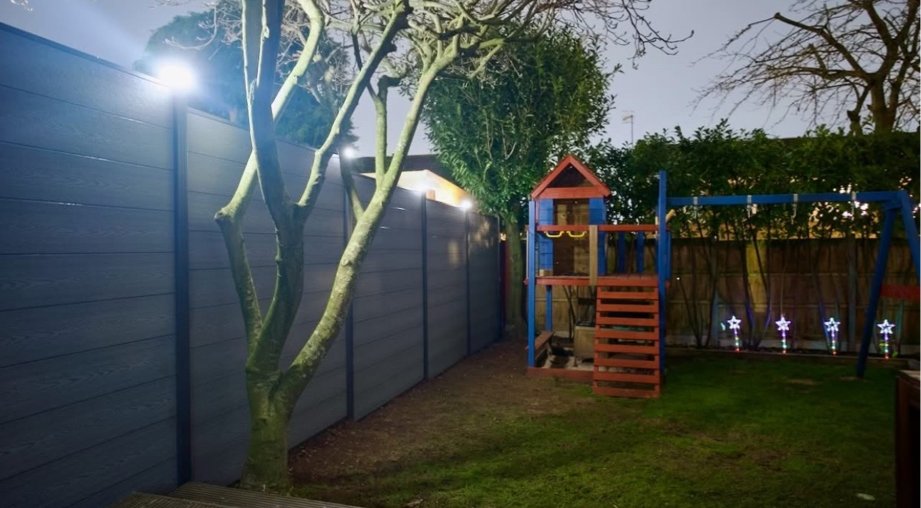 Grey composite fence with lights